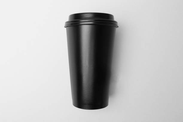 istock Blank black paper cup on the grey background 639845980
