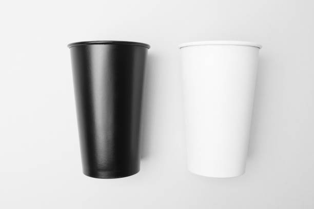 istock Blank white and black paper cup on the grey background 639846068