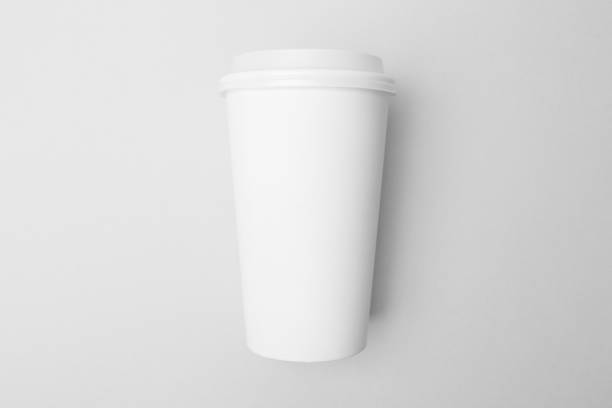 istock Blank white paper cup on the grey background 639846144