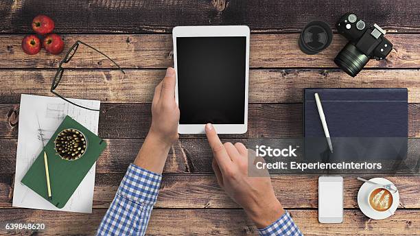 Man Hipster Holding Tablet Knolling Overhead View Stock Photo - Download Image Now - Desk, Coffee - Drink, Digital Tablet