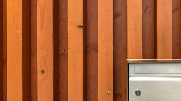 istock Mailbox with little snow on it on wooden wall 639849258
