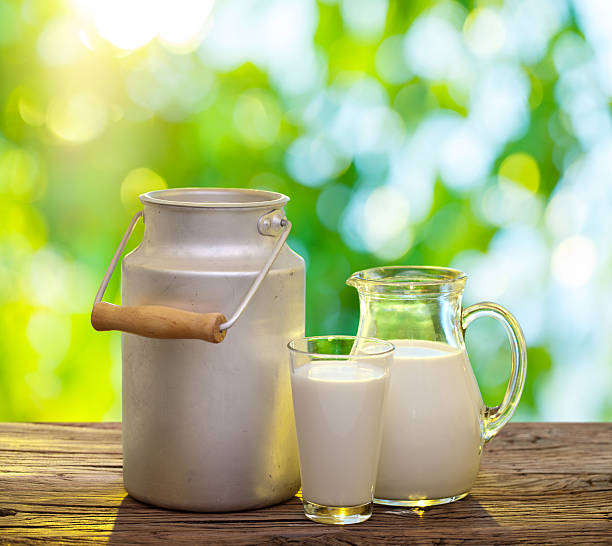 istock Fresh milk on the old wooden table. 639853186