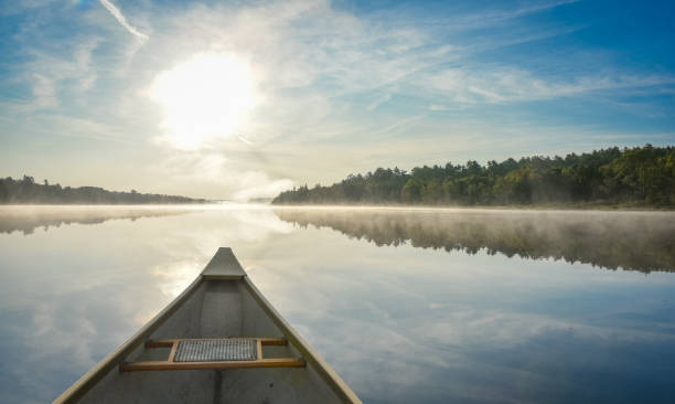 istock Canoeing on a misty summer morning on Corry Lake. 639853674
