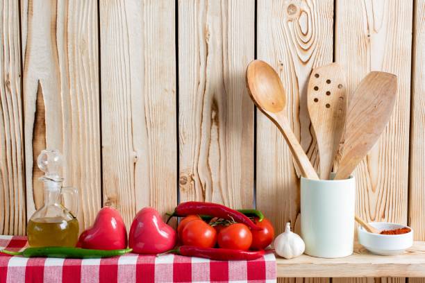 istock Fresh Vegetables And Cooking Utensils On Wooden Shelf 639853758