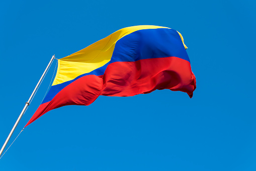 Flag of Colombia to the wind Cartagena de Indias, Colombia. Castillo San Felipe de Barajas