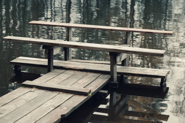 istock Bench on the end of floating pier 639855928