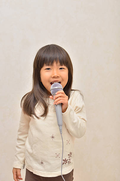 istock Singing Japanese girl 639857650