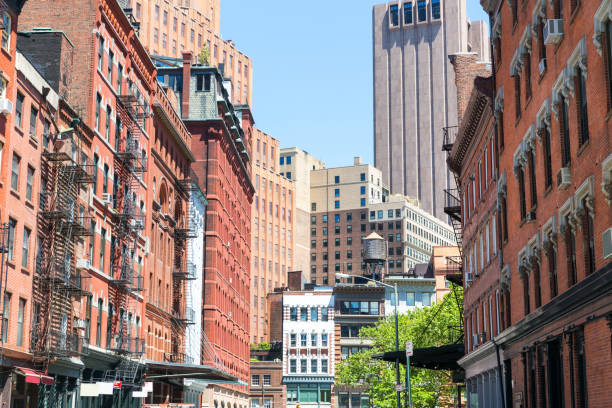istock Street with brick buildings and skyscraper. 639860360