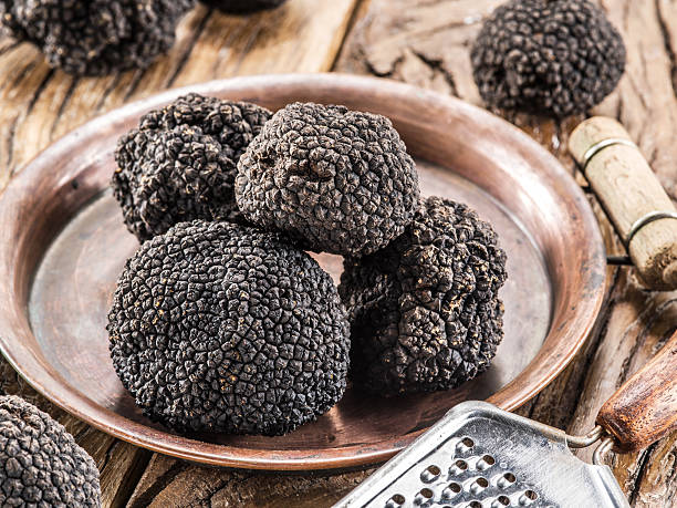 istock Black truffles on the plate. 639862872