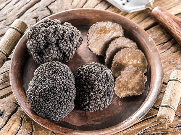 istock Black truffles on the plate. 639862878