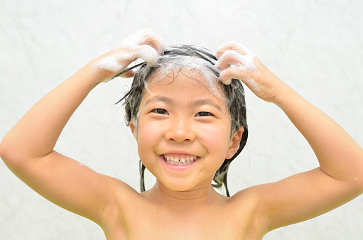 Japanese girl washing her hair