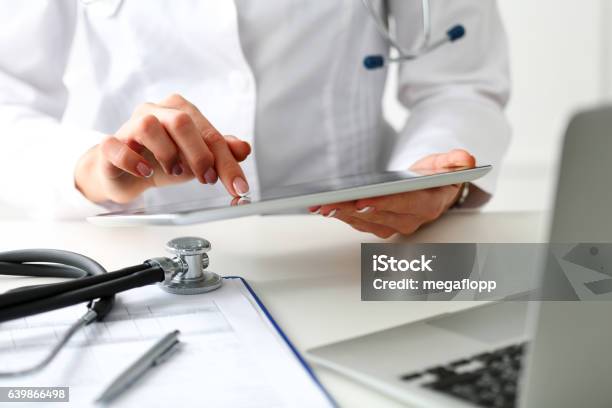 Female Doctor Hold Digital Tablet Pc Stock Photo - Download Image Now - Education, Doctor, Healthcare And Medicine
