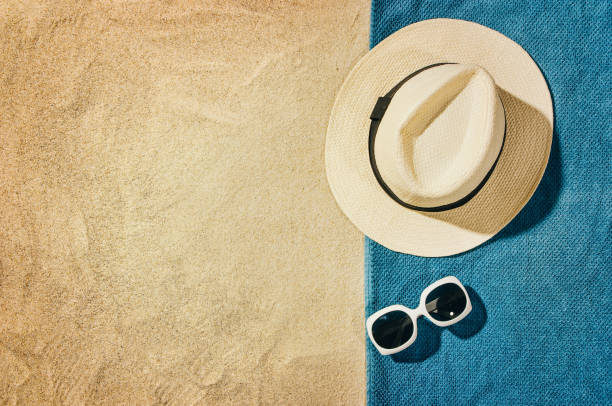 istock Top view towel on sandy beach. Background with copy space 639867192