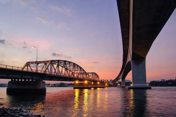 istock bangkok bridge with beautiful twilight background 639868410