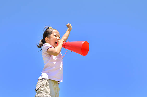 istock Japanese girl with megaphone 639871188