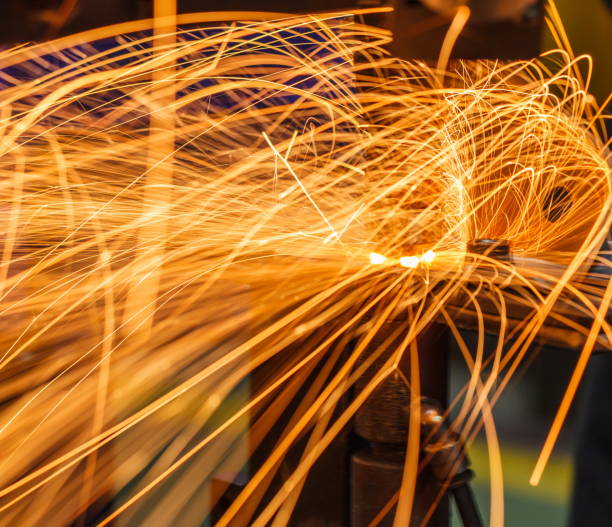 istock Sparks while spot poin welding steel 639873972