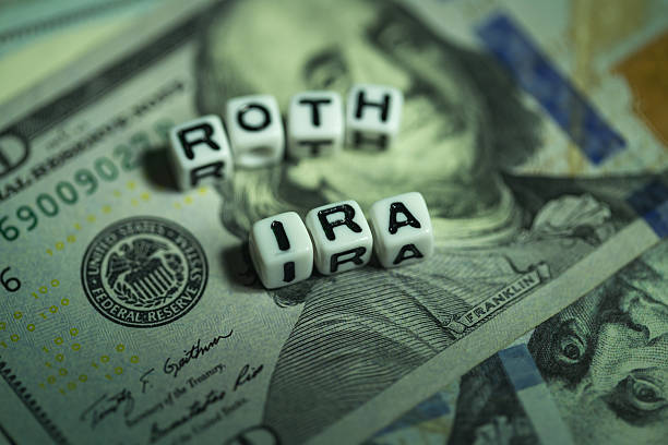 istock IRA cubic letter on dollar money surface 639877716