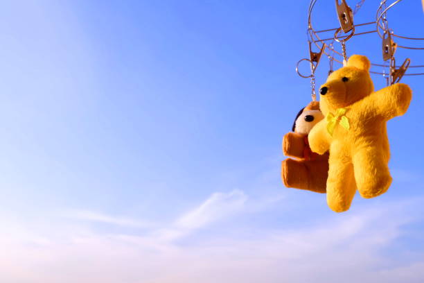 istock teddy bear blue sky in the morning. 639879302