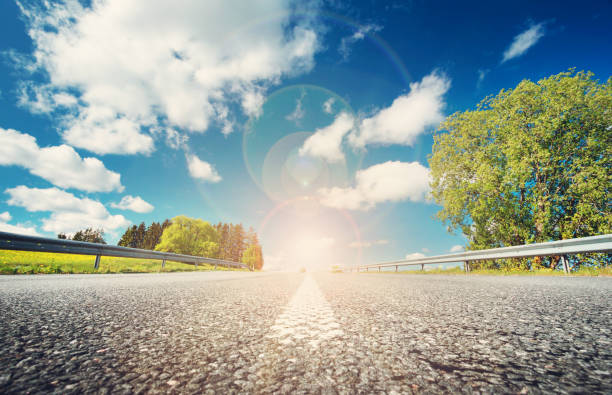 istock Car on asphalt road in beautiful spring day 639881384