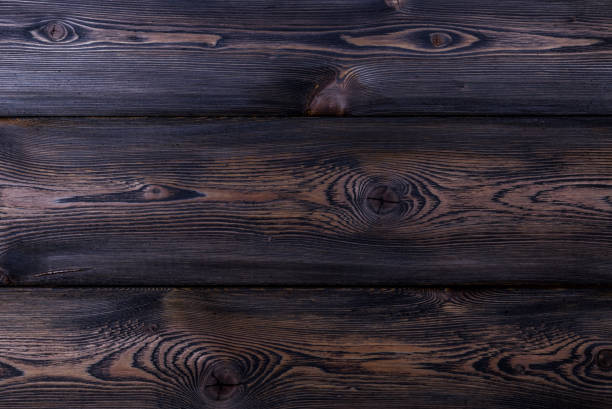 istock Dark wooden background texture 639883834