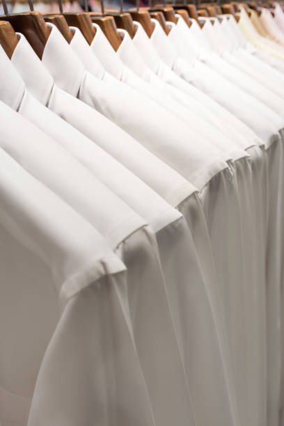 istock row of white shirts 639885088