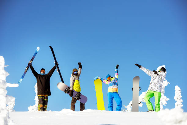 istock Group happy friends snowboard ski concept 639887524