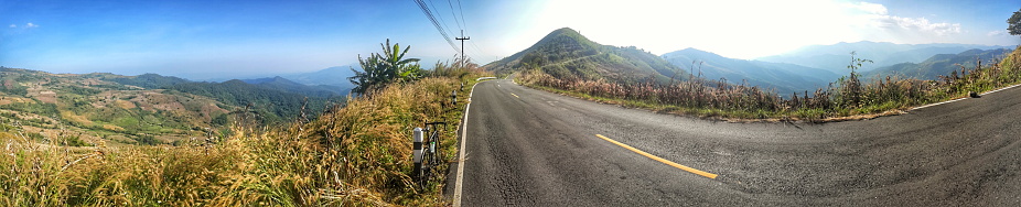 riding a bicycle on hill. .doi chang, chiang rai, thailand