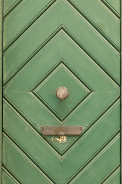 istock Green painted wooden door with diamond pattern 639888064
