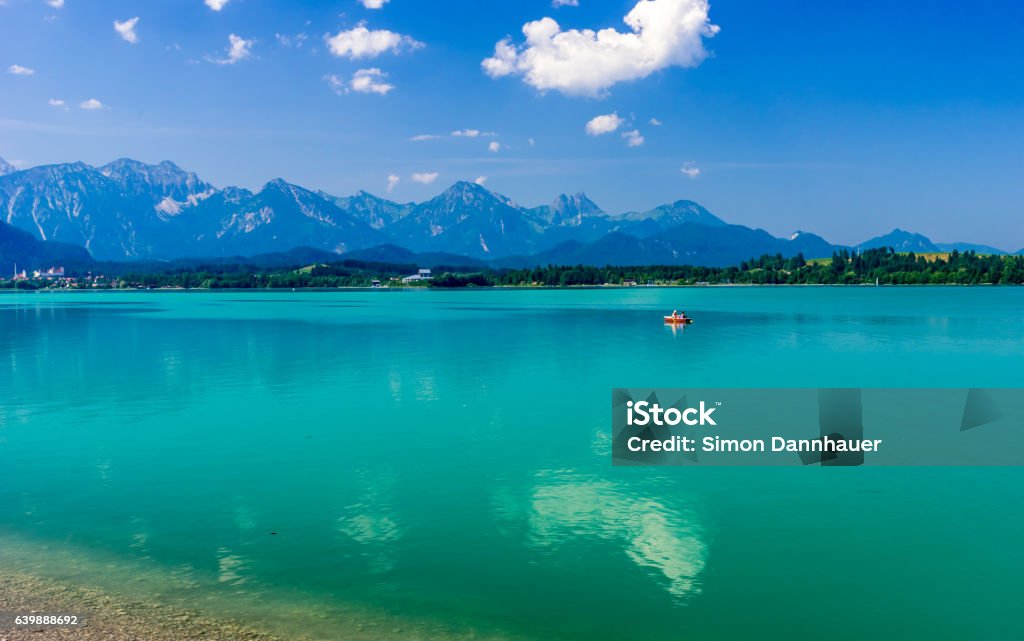 Lake Forggensee in Allgäu - Germany Lake Forggensee in Allgäu - South of Germany Neuschwanstein Castle Stock Photo