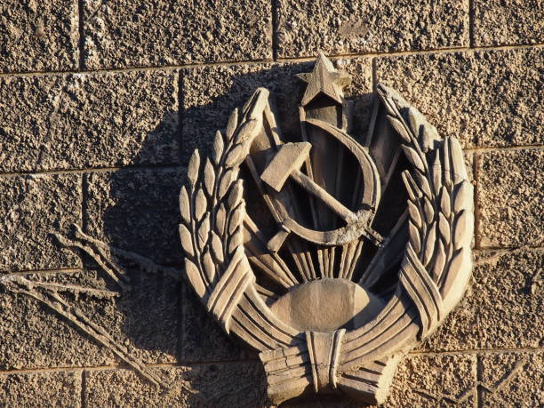 istock Hammer and Sickle on Concrete 639893484