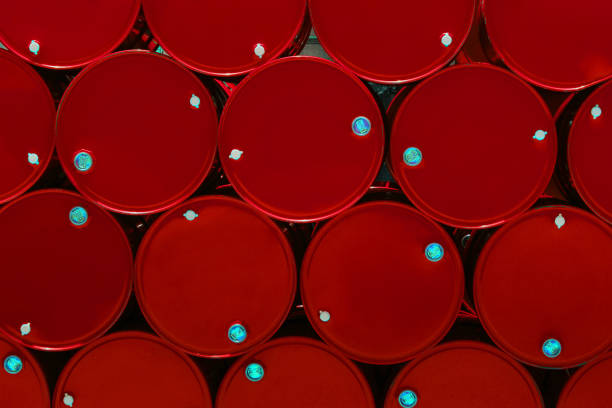 red steel chemical tanks or oil tanks stacked in row. - oil shipping industrial ship oil tanker imagens e fotografias de stock