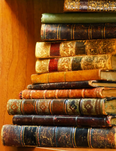 istock Stack of antique books on shelf 639895540