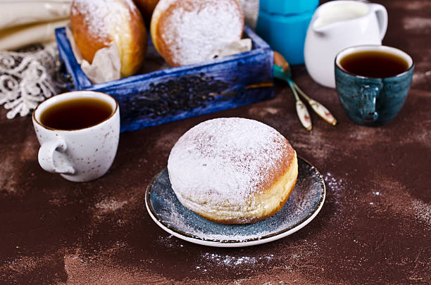 istock Traditional donuts with powdered sugar 639896288