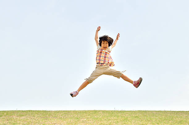 istock Jumping Japanese girl 639897384
