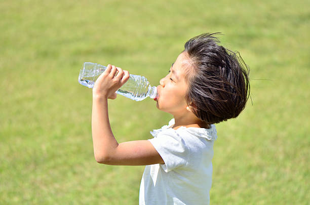 istock Japanese girl drinking water 639898470
