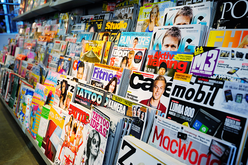 News stand. Mixed magazines and papers.