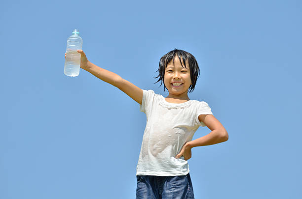 istock Japanese girl drinking water 639906280