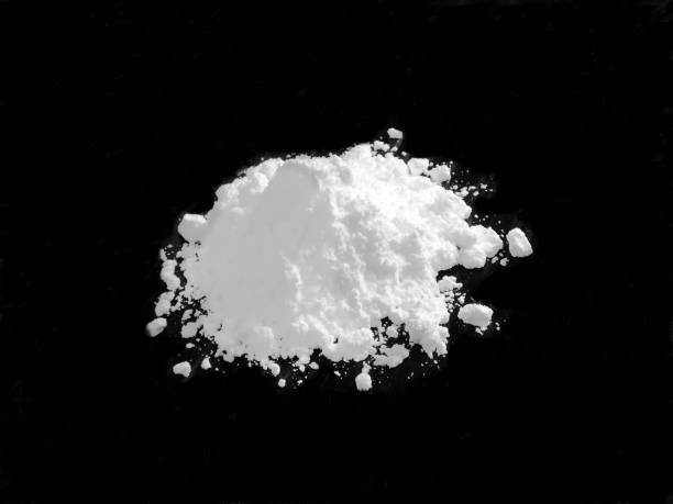 istock Cocaine drug powder pile on black background 639906330