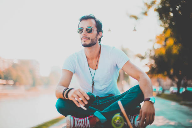 istock Hipster drinking coffee in the street 639906964