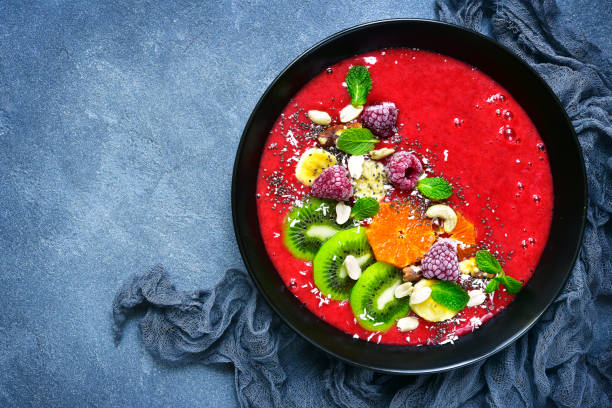istock Healthy raspberry banana smoothie bowl .Top view. 639907004