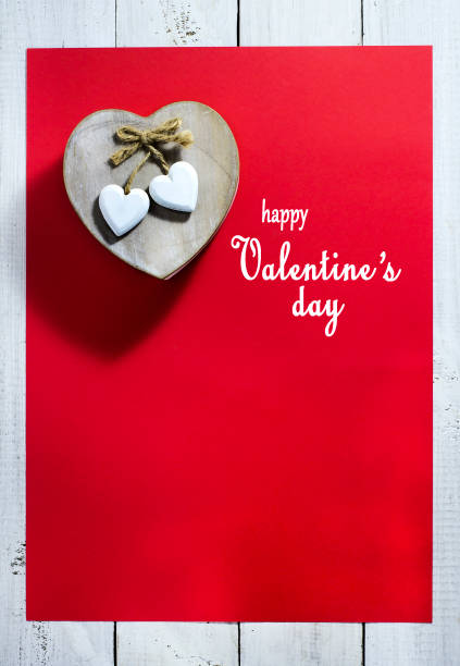 istock Valentine's Day card with hearts on a red background 639911532