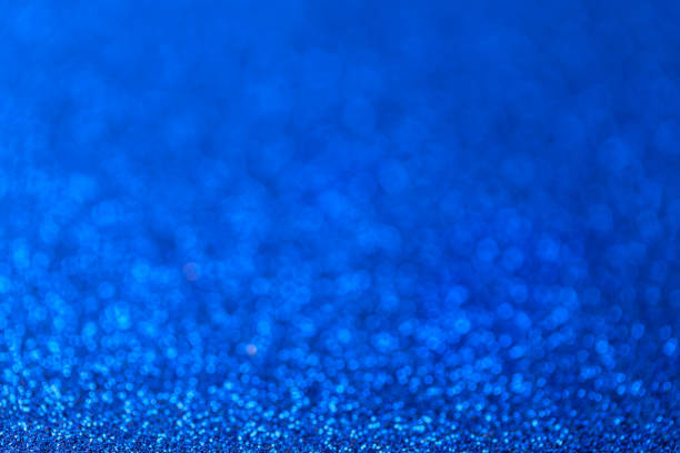 istock Blue sparkling background from small sequins, closeup. Brilliant backdrop 639914248