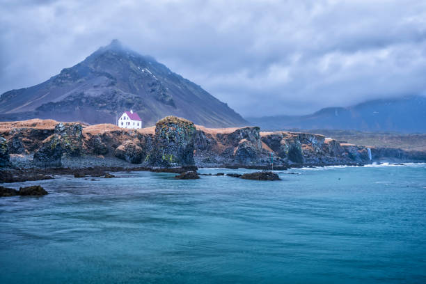 istock House on ocean cliff in Iceland 639916970