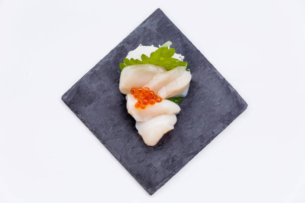 istock Hotate Sashimi Served with Ikura (Salmon Roe) and Sliced Radish. 639920094