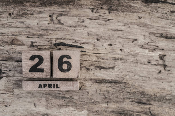 istock Cube calendar for april on wooden background 639923246
