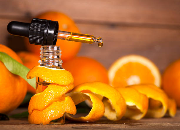オレンジエッセンシャルオイル - tangerine citrus fruit organic orange ストックフォトと画像