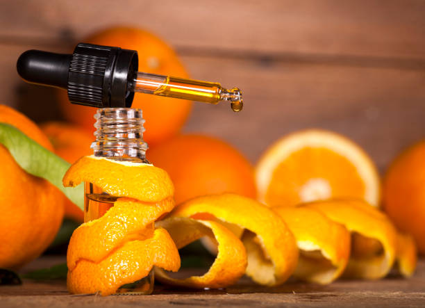 orange essential oil - drop herbal medicine leaf perfume imagens e fotografias de stock