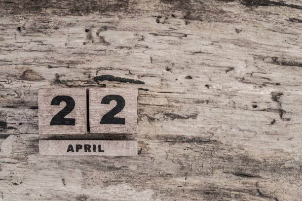 istock Cube calendar for april on wooden background 639923706