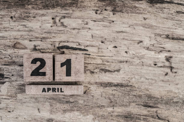istock Cube calendar for april on wooden background 639924562