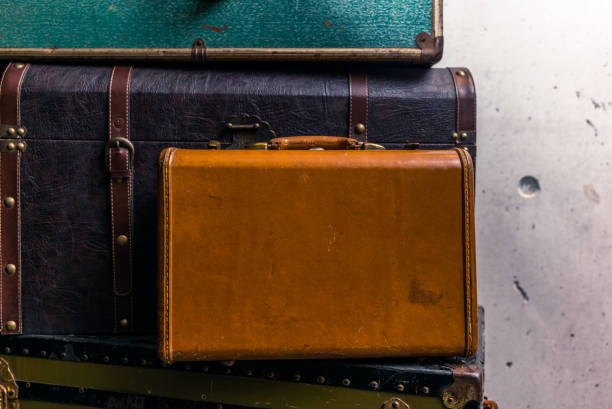 istock Stack of colorful vintage suitcases - 5 639924712